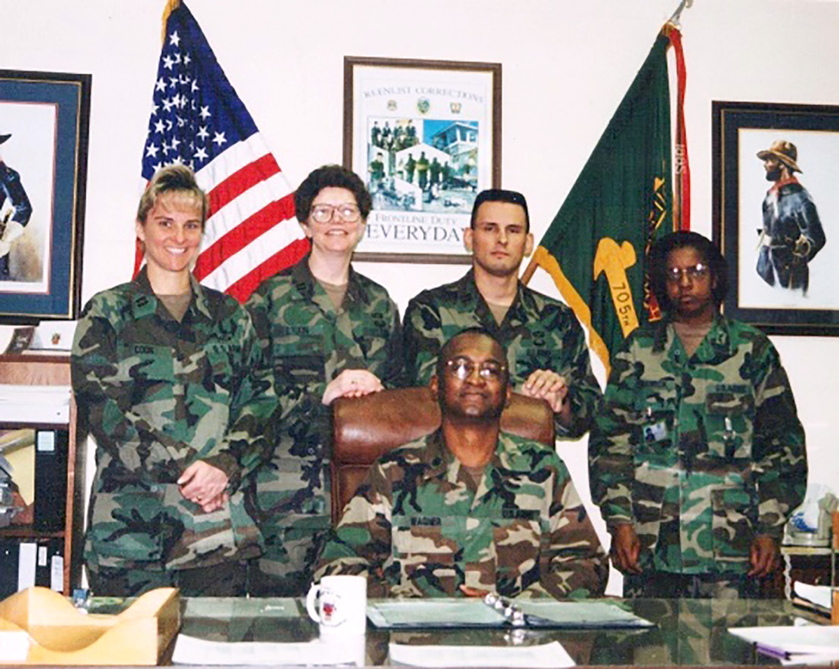 a group of Company commanders posing for the photograph