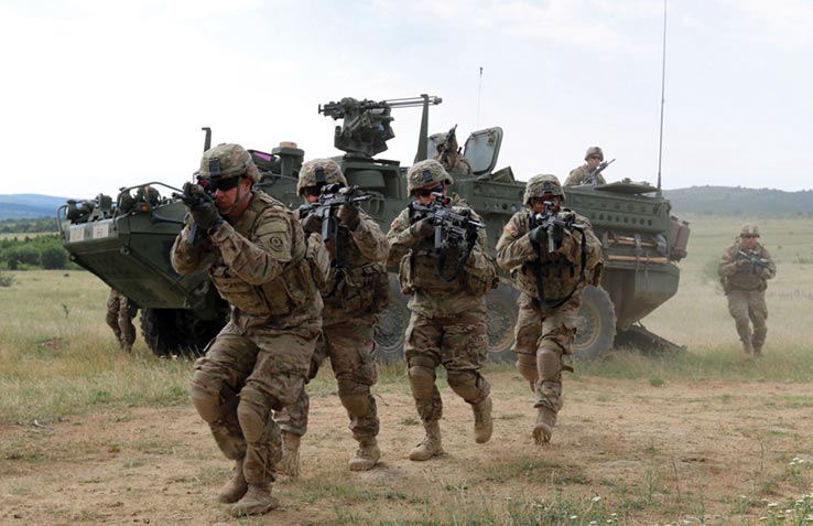 Soldiers with 2nd Squadron, 2nd Cavalry Regiment dismount their Stryker combat vehicle to join Bulgarian army special forces soldiers as they conduct a cordon-and-search during Kabile 15, a multilateral joint-training exercise, as part of Operation Atlantic Resolve 17 June 2015 at Novo Selo Training Area, Bulgaria. (Photo by Spc. Jacqueline Dowland, U.S. Army)