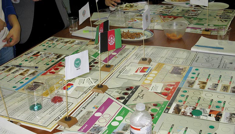 Emulating military sand table techniques used for planning combat operations, a board game titled Stabilization Operations in Highly Religious Societies was developed by Law Enforcement Crisis Management (LECMgt)