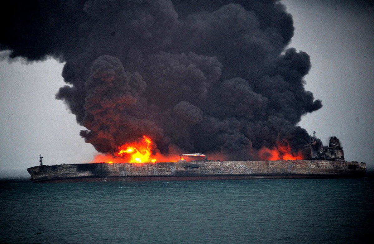 A ship at sea on fire
