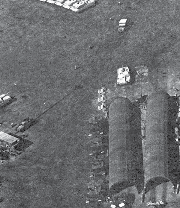 VII Corps tanks receiving their desert camouflage at a painting facility in Ad Dammam, 1 January 1991.