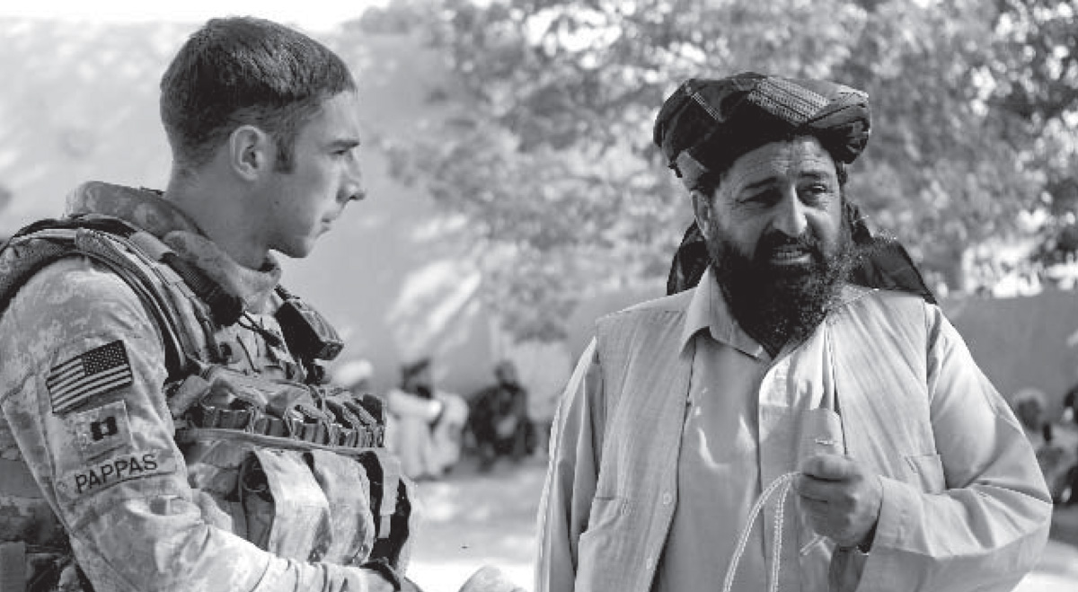 Photo of a support team leader talking with a district chief