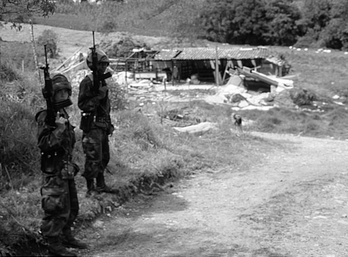  Soldiers
guard the site of a bombing