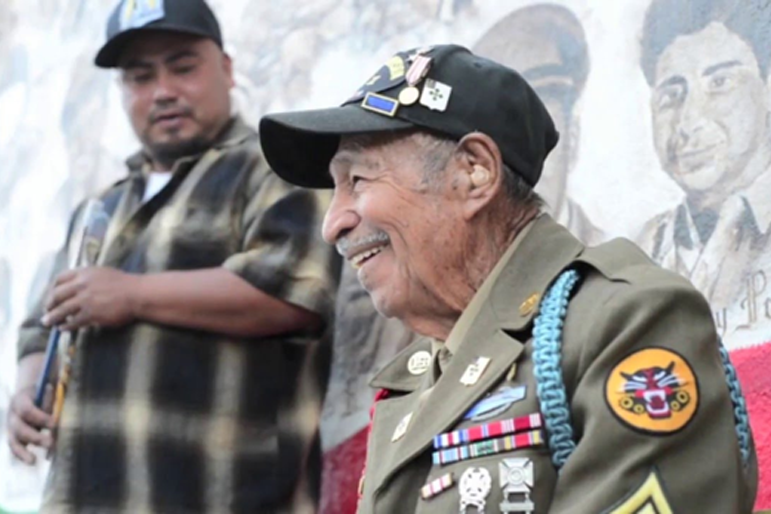 A Mexican-American World War II veteran is honored during a mural unveiling in Santa Ana, Calif., celebrating the contributions of Mexican-American servicemembers to the U.S. national defense 17 May 2016