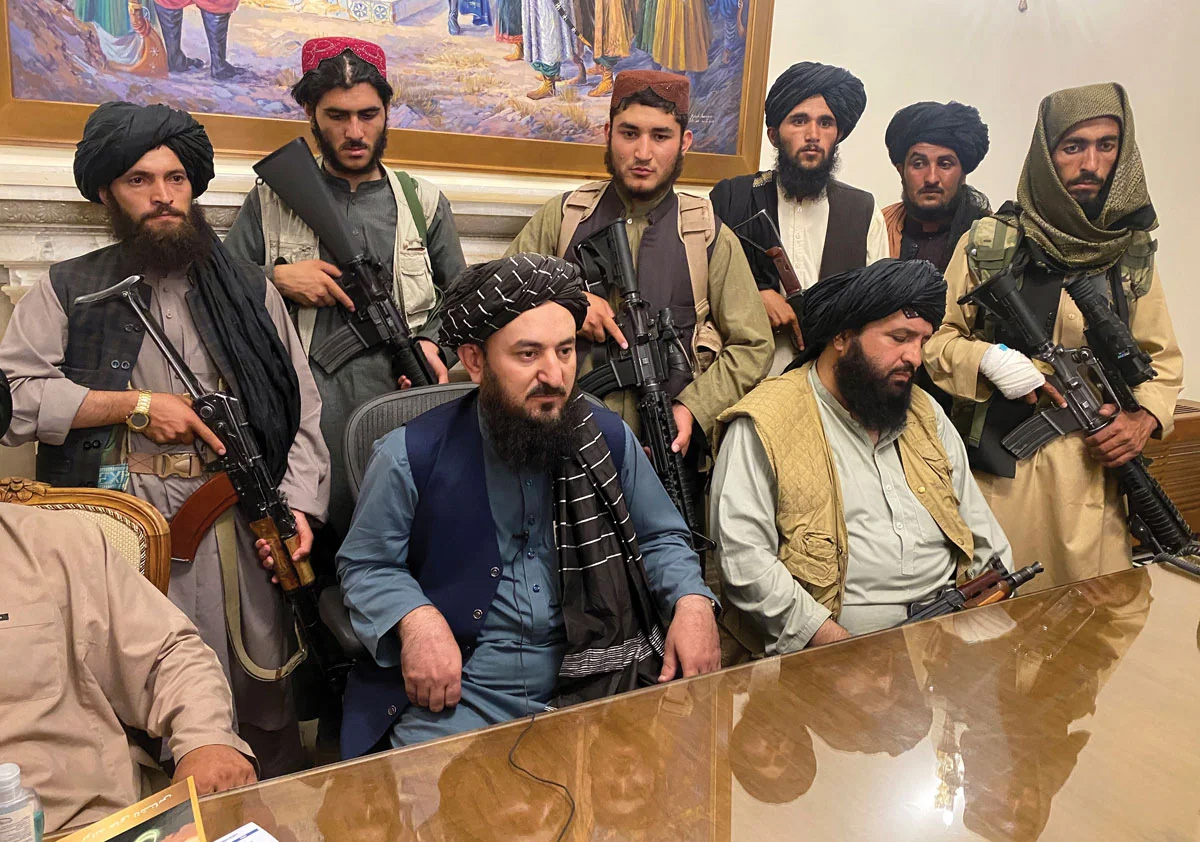 Taliban fighters take control of the Afghan presidential palace in Kabul