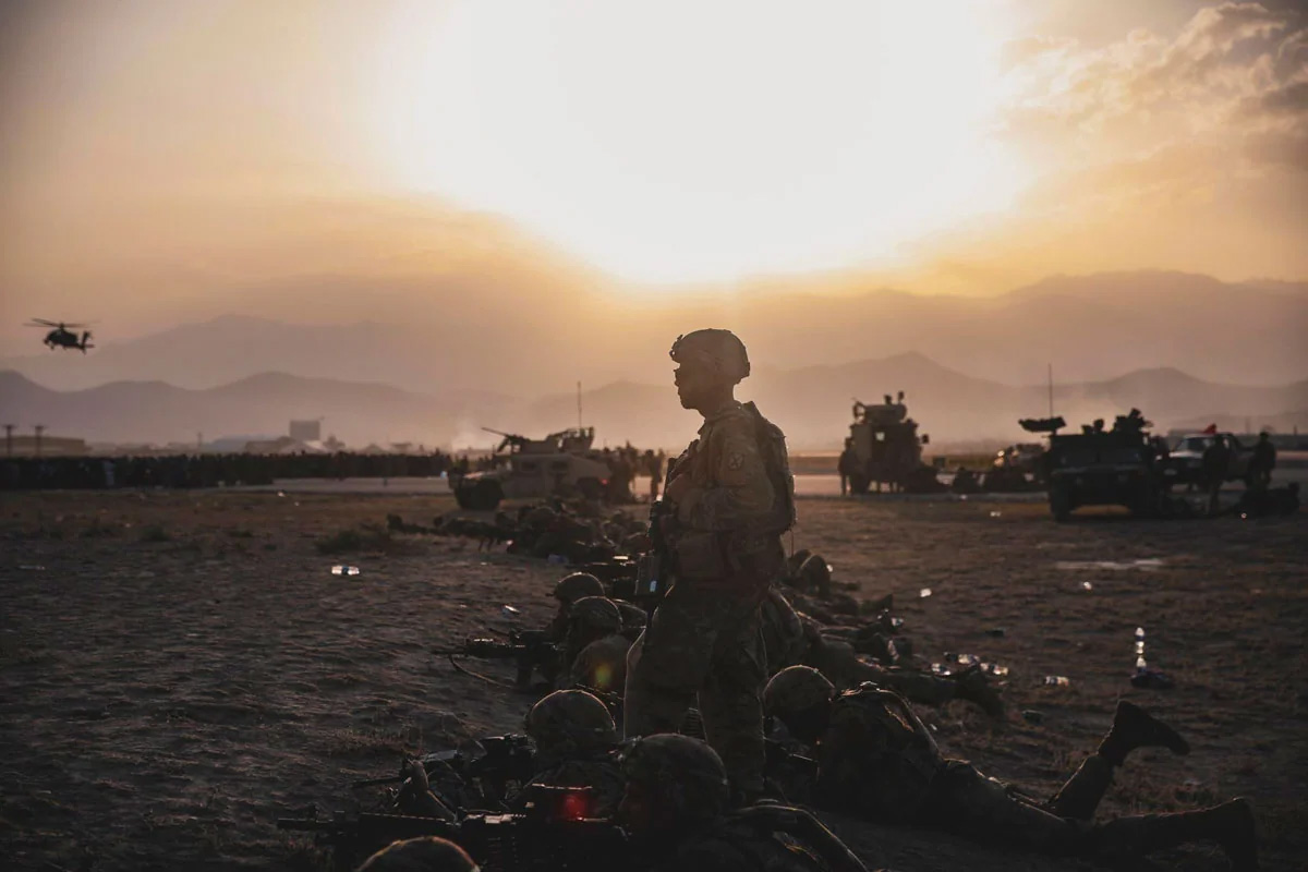 Soldiers assigned to the 10th Mountain Division stand security 15 August 2021