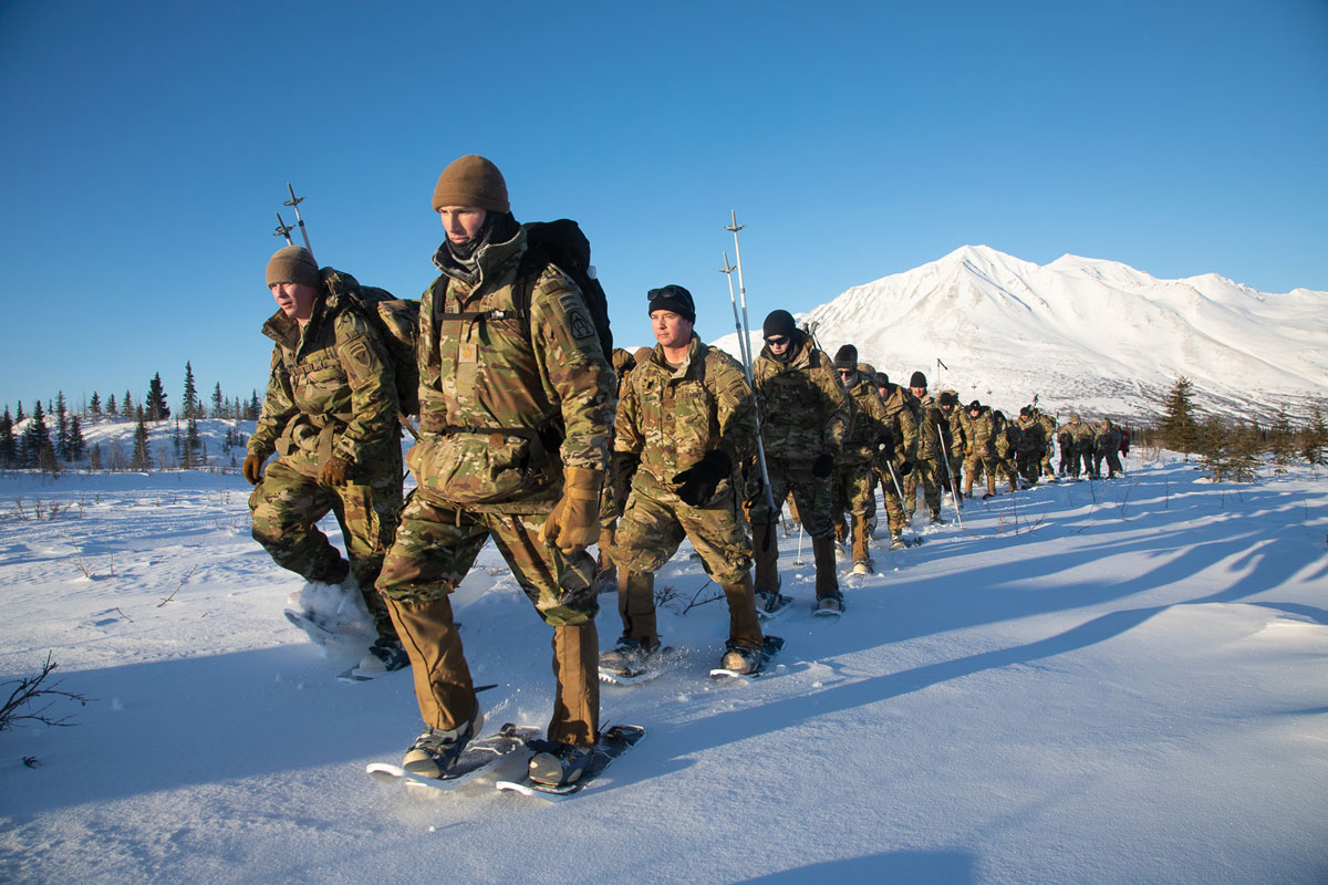 Soldiers from Company D, 70th Brigade Engineer Battalion, and the Army Test and Evaluation Center conduct snowshoe testing at the Cold Regions Test Center
