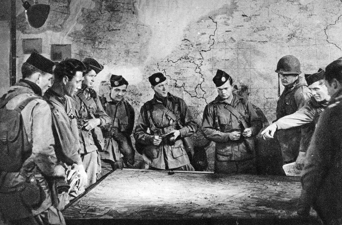 Members of the 442nd Troop Carrier Group plan missions into Europe during World War II. U.S. Army doctrine was focused primarily on the European theater until the transition to multidomain operations codified in Field Manual 3-0