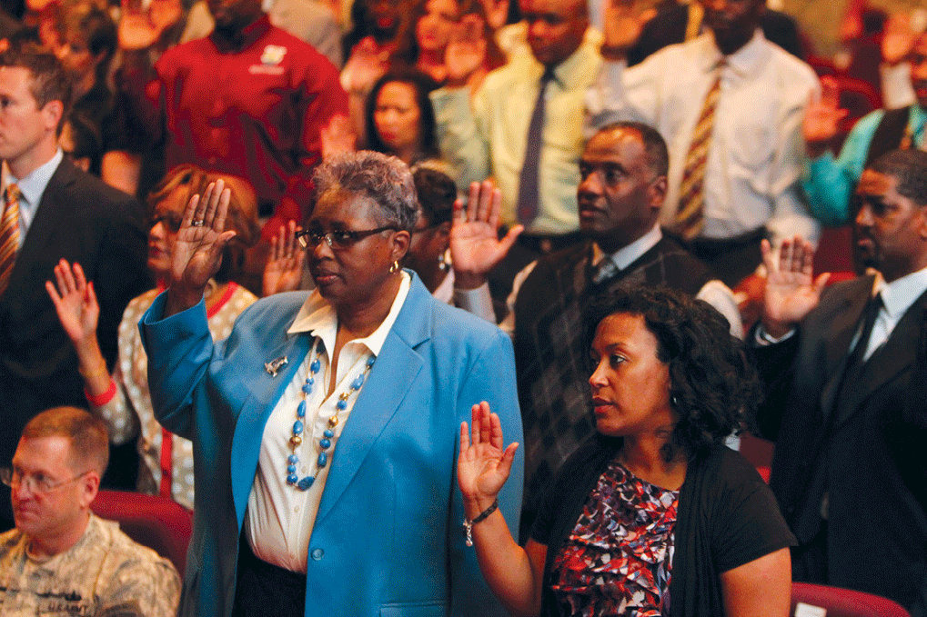 Northern Regional Medical Command civilian staff members recite the Army Civilian Corps Creed 26 April 2012