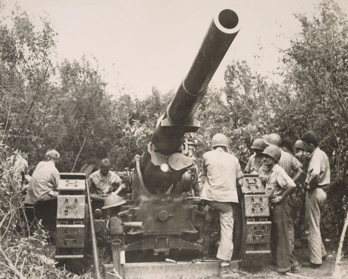 Marines work a 155 mm gun position on Guadalcanal in 1942