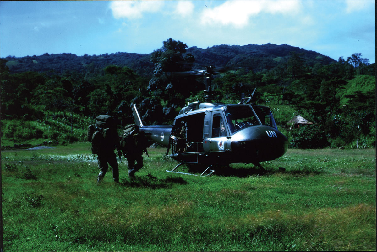 Irish infantry soldiers serving with the follow-on UN peacekeeping force board a New Zealand Army helicopter
