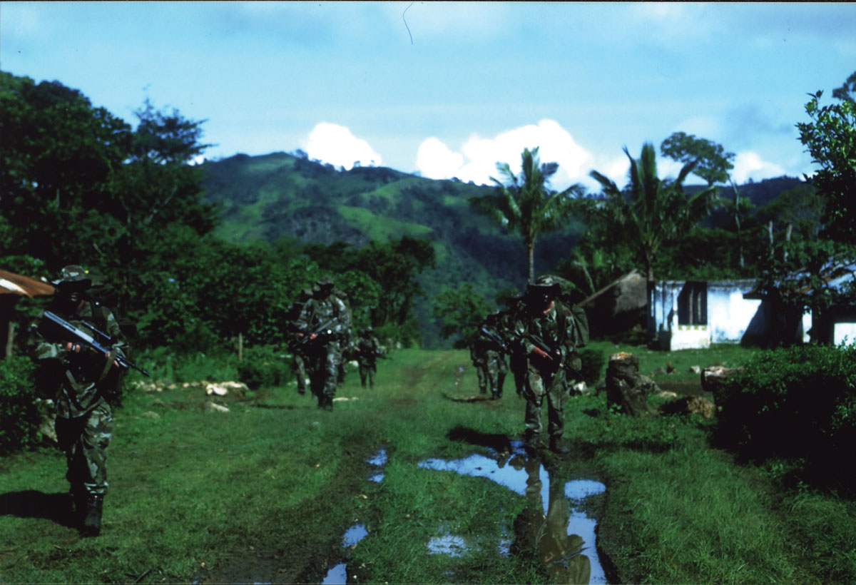 Heavily laden soldiers of 5th Irish Contingent, drawn from the Irish Army’s 4th Infantry Battalion, return from a long-range patrol