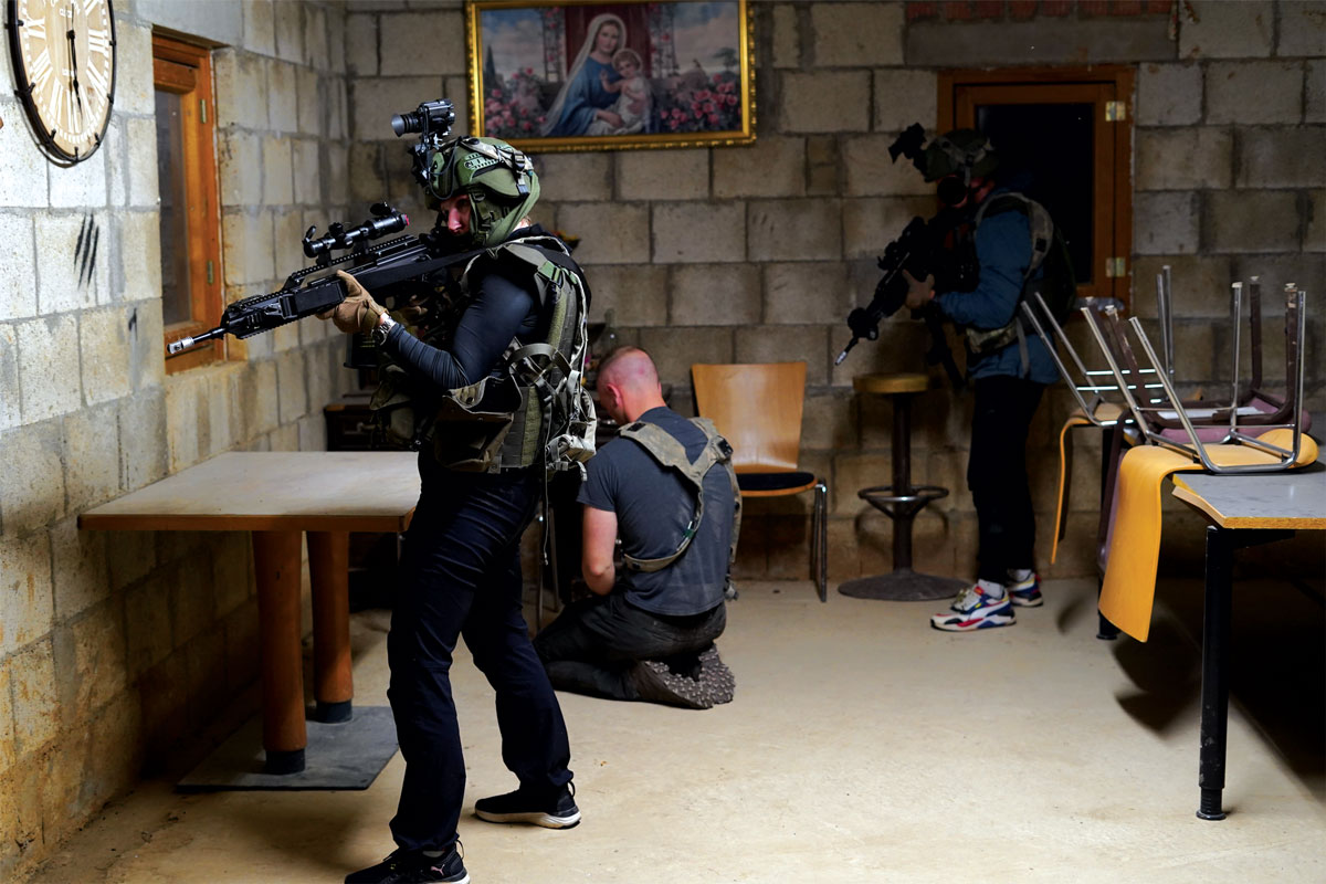 A special operations forces (SOF) training unit conducts an urban raid during Combined Resolve 24 at Hohenfels Training Area, Germany