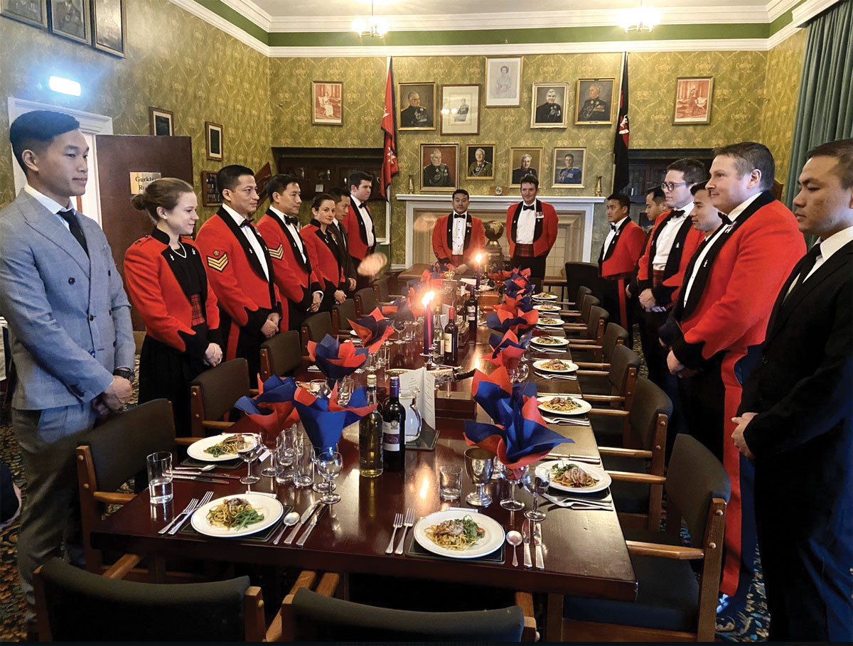Members of the United Kingdom’s 250th Gurkha Signal Squadron hold a dinner night for their corporals 21 February 2020 in the Gurkha Room