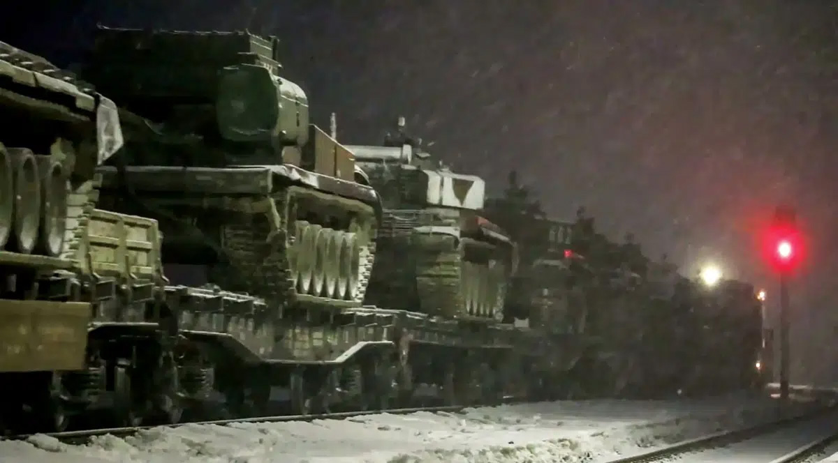 Russian tanks in the snow and on a train.