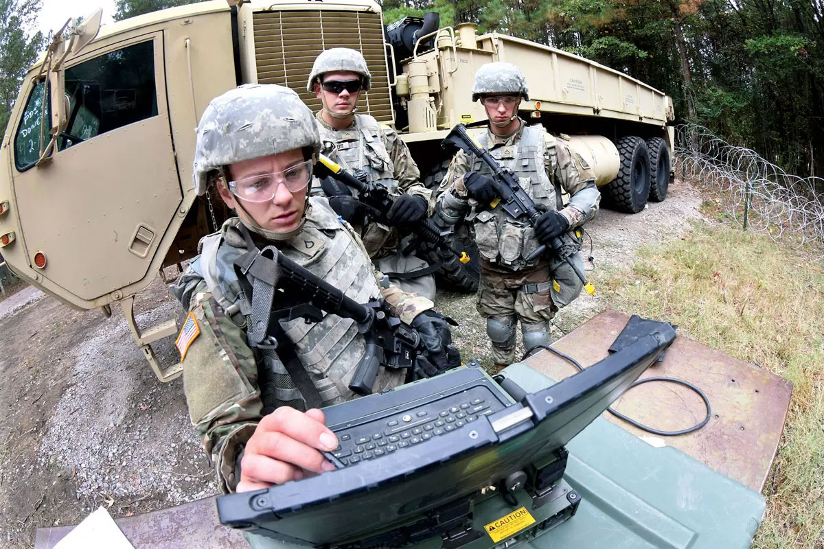 Pfc. Rachelle Blackman inputs information into a computer