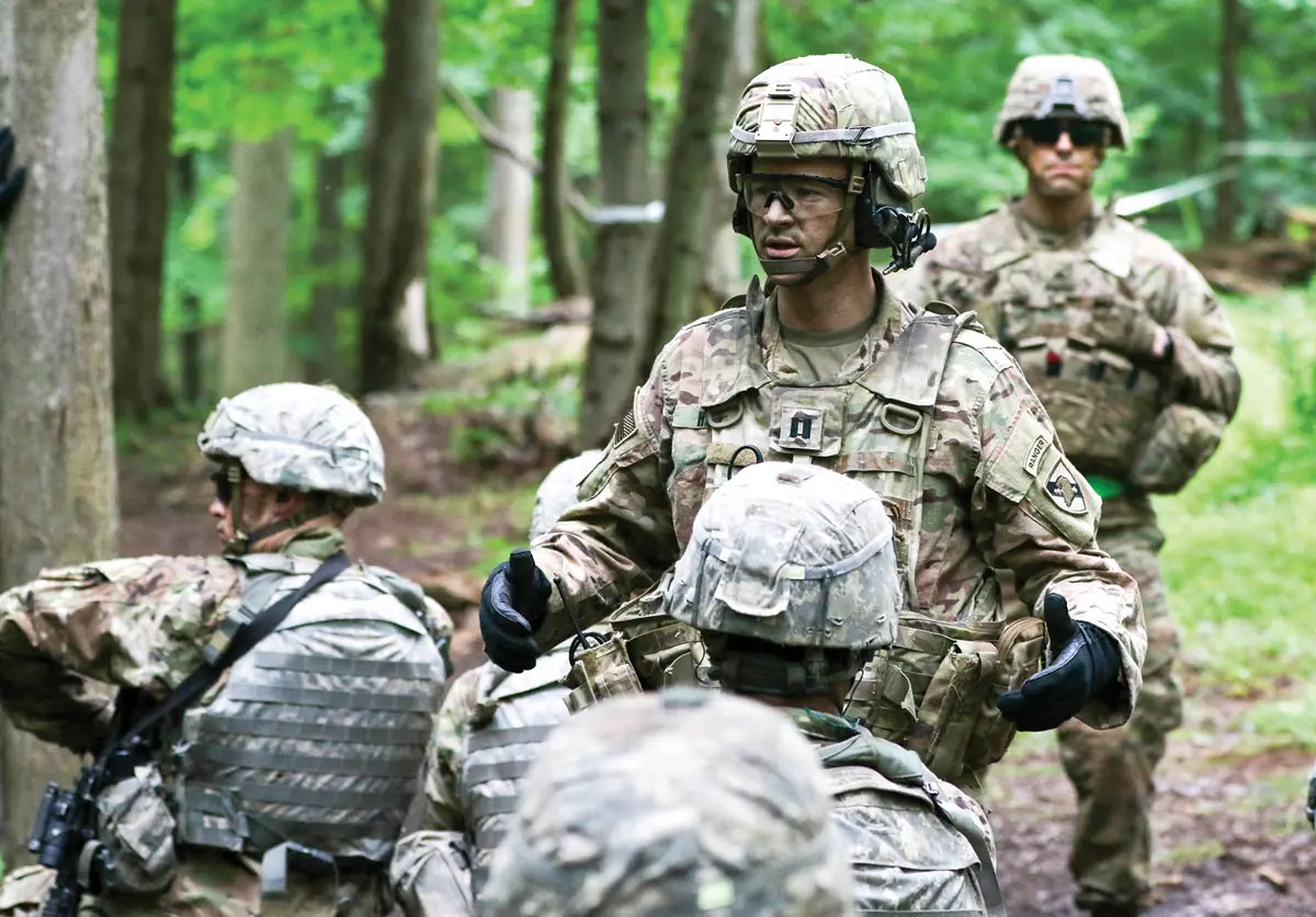 Capt. Samuel Herbert, a systems engineering professor, briefs class of 2022 cadets prior to squad live-fire drills during the U.S. Military Academy’s Cadet Field Training on 18 July 2019. Herbert is one of 119 members of the dean’s faculty who assisted with summer training