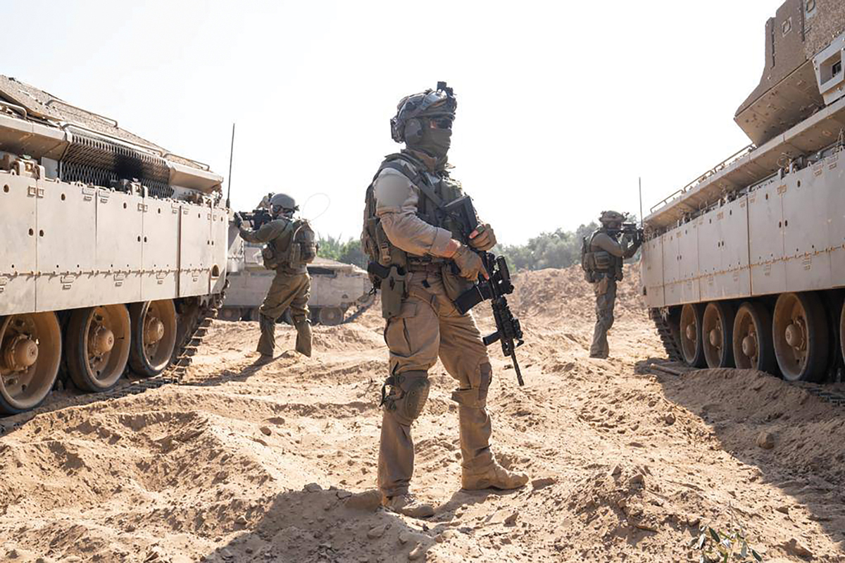 Israel Defense Forces (IDF) soldiers of the 36th Ga’ash Division’s formation conduct combat operations in the Gaza Strip