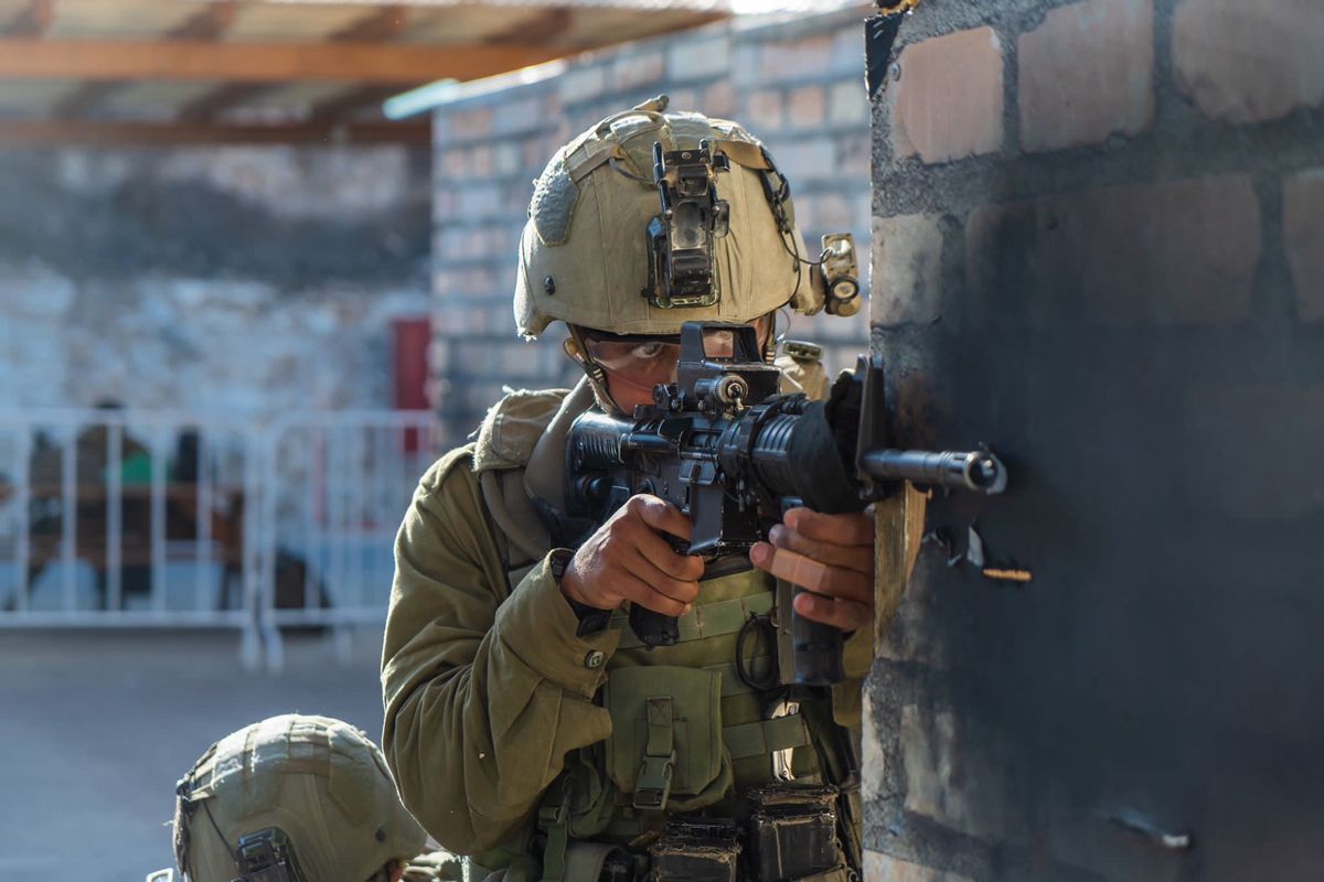 Israeli soldiers conduct live-fire training