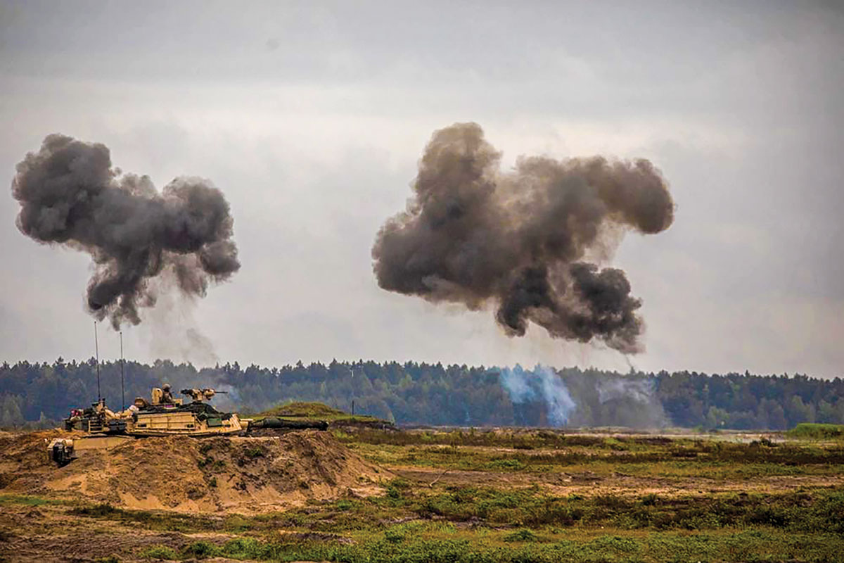 Soldiers assigned to Company B, 2nd Battalion, 70th Armor Regiment, 2nd Armored Brigade Combat Team, 1st Infantry Division, supporting the 4th Infantry Division, fire an M1A2 Abrams tank 15 May 2023 during a combined arms live-fire exercise as part of the Anakonda 23 Polish-led exercise at Nowa Deba, Poland. (Photo by Sgt. 1st Class Theresa Gualdarama, U.S. Army)