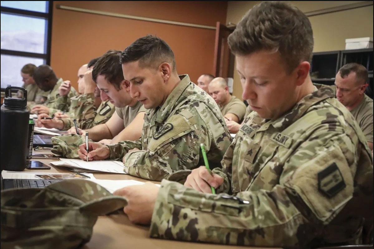 Army Reserve soldiers fill out crew evaluation worksheets 11 September 2019 at the George W. Dunaway Reserve Center in Sloan, Nevada