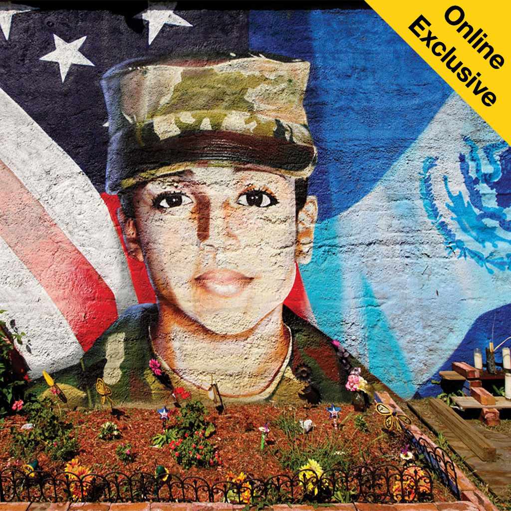 Mural of a soldier's face with flags in the background, marked 'Online Exclusive' in the corner.