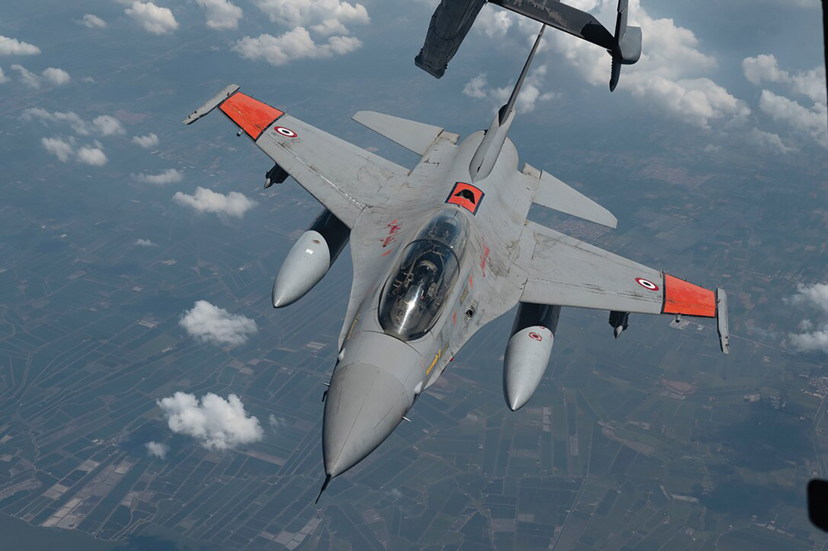 An Egyptian Air Force F-16 Fighting Falcon departs a U.S. Air Force KC-10 Extender aircraft assigned to the 908th Expeditionary Air Refueling Squadron after practicing aerial refueling 4 September 2023 over Egypt during Exercise Bright Star 23