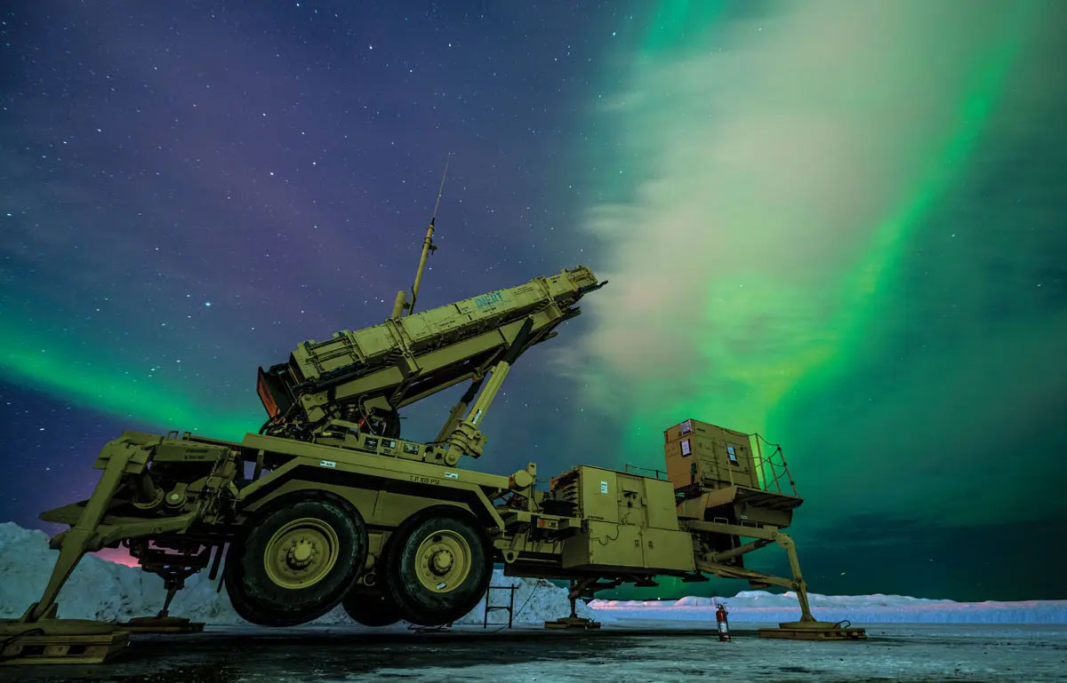 The northern lights glow behind a Patriot M903 launcher