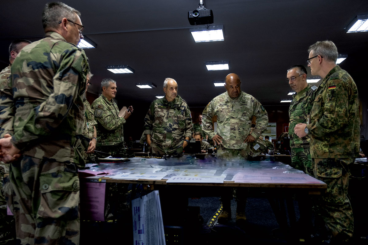 Gen. Darryl Williams (right center), commanding general of U.S. Army Europe and Africa and commander of the NATO Land Command, discusses mission command execution with senior officers from NATO’s Headquarters Allied Rapid Reaction Corps on 18 October 2023 during Steadfast Jupiter 2023 in Romania