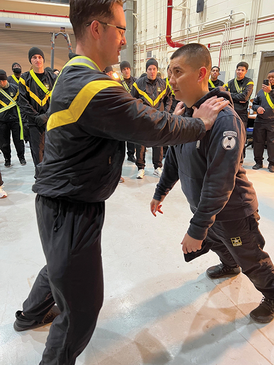 Sgt. 1st Class Christian Olivarez instructs 2nd Brigade Support Battalion soldiers during a run class in the Republic of Korea.