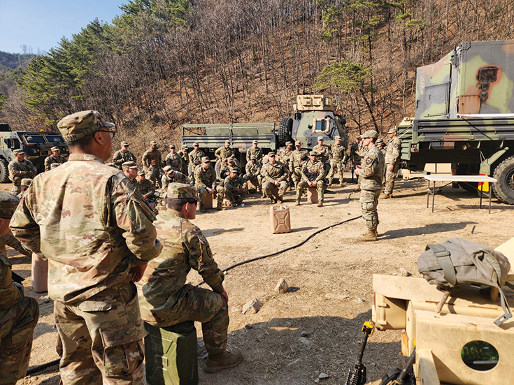 Capt. Sean Boulanger instructs soldiers from Company B, 2nd Brigade Support Battalion, on body mechanics during a deployment to the Republic of Korea. (Photo by Capt. Shawn Maddison, U.S. Army)