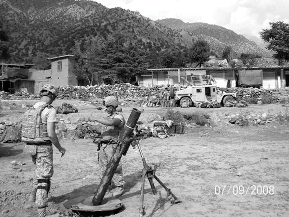 This 9 July 2008 photo shows a view of the Wanat combat outpost located in the rugged, mountainous terrain of Nuristan Province, Afghanistan