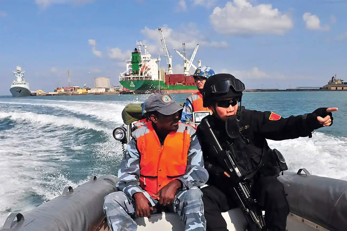 Photo of three people on a small boat