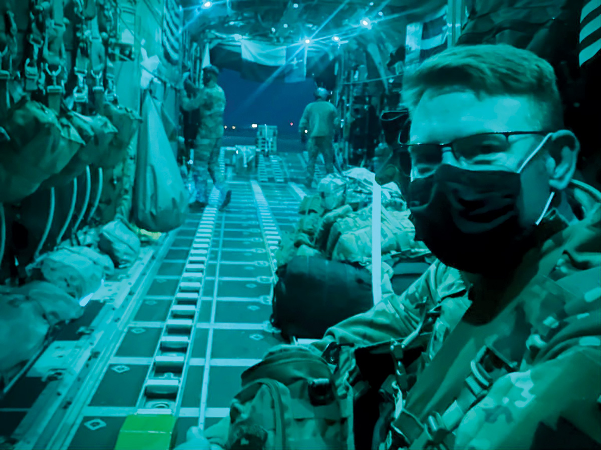 A photo a soldiers inside of a airplane