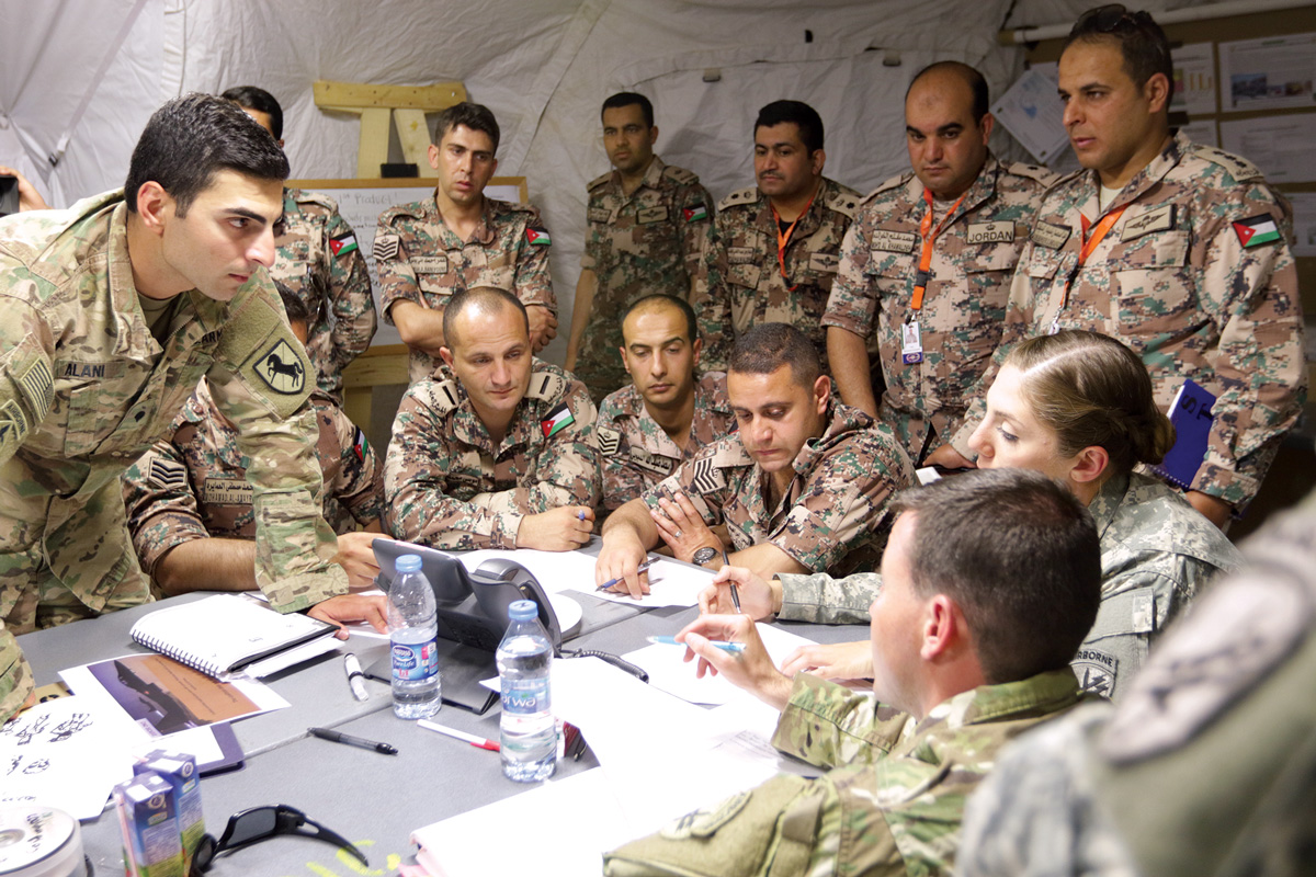 Soldiers meeting around a table