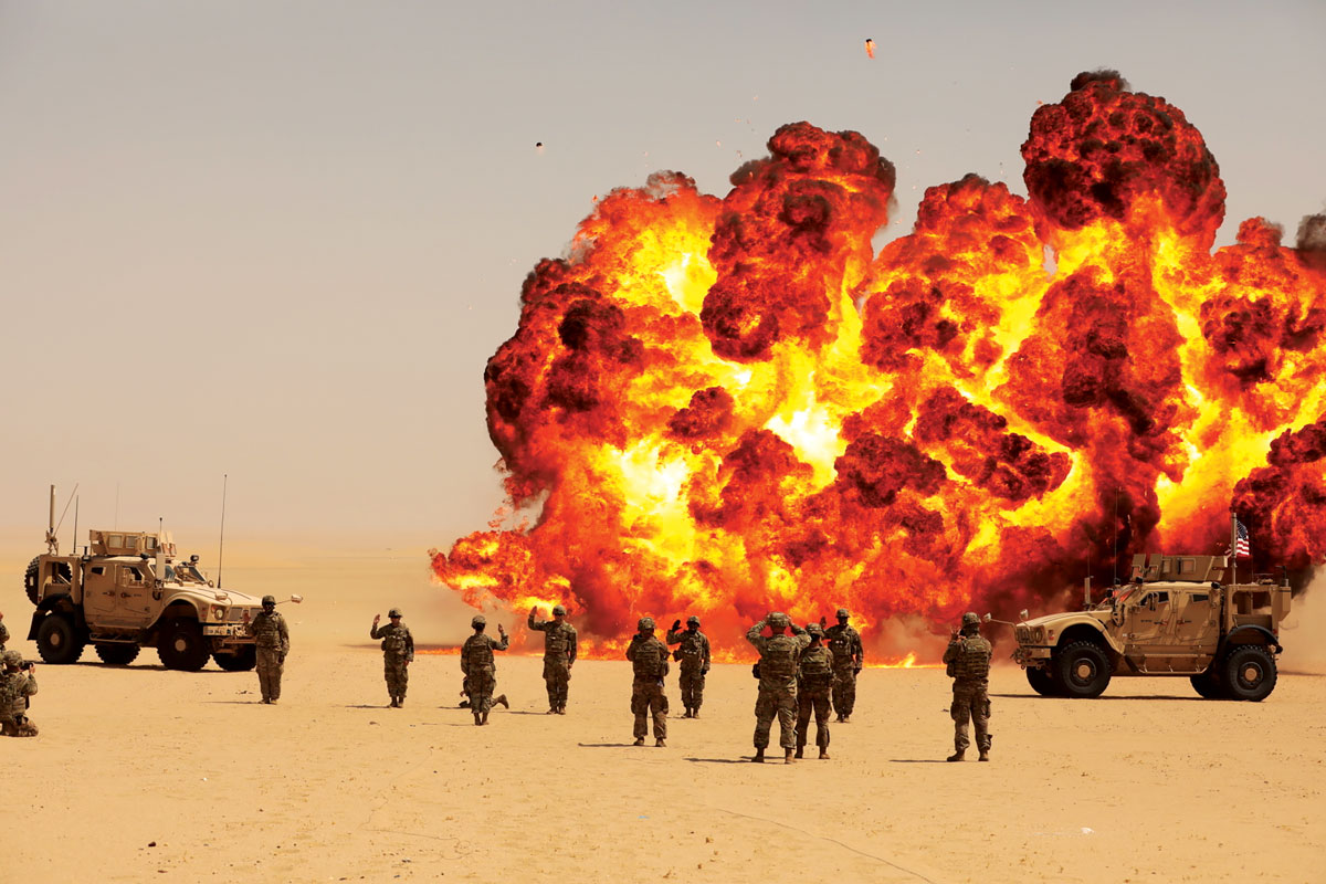 A mass reenlistment for soldiers with the Division Special Troops Battalion, 3rd Division Sustainment Brigade, and 541st Combat Sustainment Support Battalion is highlighted by a fireball detonation on an explosive ordnance disposal range at Camp Buehring, Kuwait, 8 September 2021