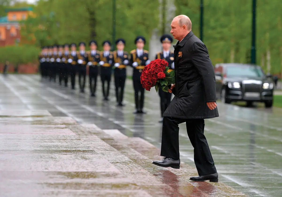 Russian President Vladimir Putin attends a laying ceremony 9 May 2020 at the Tomb of the Unknown Soldier at the Kremlin Wall in Moscow, marking the seventy-fifth anniversary of the Nazi defeat in World War II