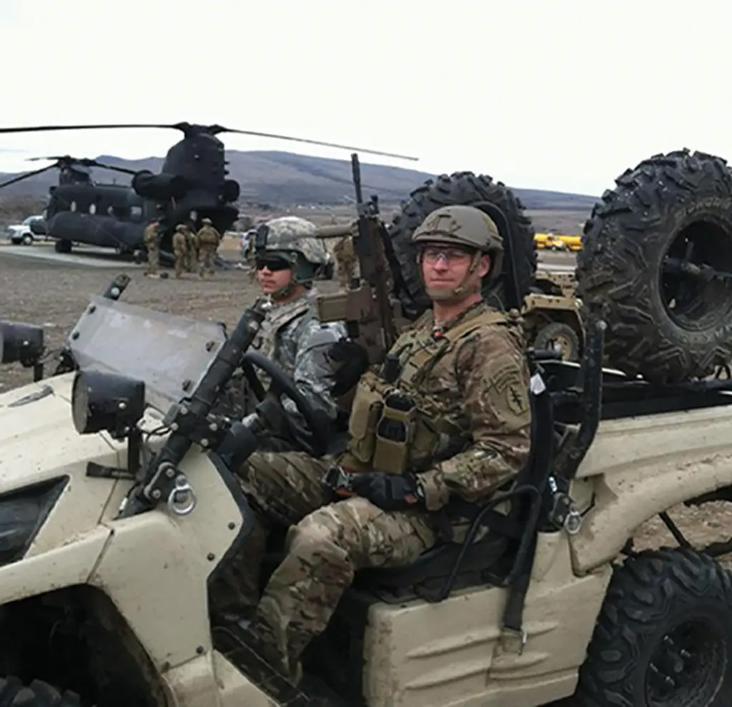Then Staff Sgt. Earl Plumlee poses for a photo during predeployment training circa 2013 in Yakima, Washington
