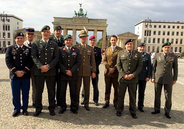 erman Staff College students stand in front of the Brandenburg Gate