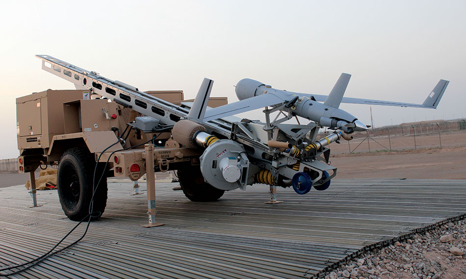 A ScanEagle prepares for launch 14 April 2016 in Helmand Province, Afghanistan. (Photo by Lt. Charity Edgar, U.S. Navy)