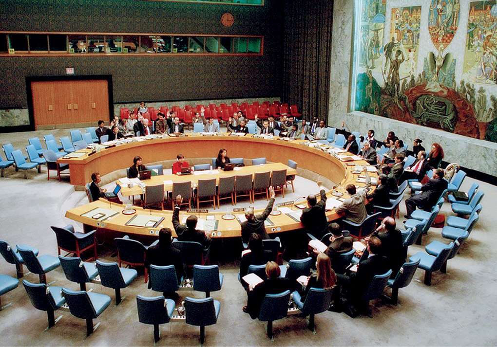 The United Nations (UN) Security Council votes unanimously to adopt Resolution 1325 on 31 October 2000 at the UN headquarters in New York City, urging an enhanced role for women in preventing conflict, promoting peace, and assisting in postconflict reconstruction within UN operations. Resolution 1325 calls on all actors involved to adopt a gender perspective when negotiating and implementing peace agreements and further calls on all parties to armed conflict to fully respect international law applicable to the human rights of women and girls as civilians and as refugees. (Photo by Milton Grant, UN)