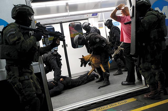 Brazilian police of Batalhão de Operações Policiais Especiais (BOPE, a special operations unit) conduct interagency training in the Rio de Janeiro