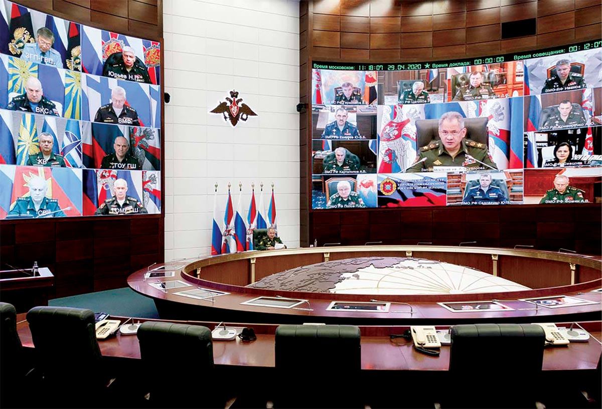 Russia’s Defence Minister Sergei Shoigu holds a virtual meeting of the Russian Defence Ministry Board in Moscow on 29 April 2020 that includes Chief of the General Staff Valery Gerasimov, other key General Staff members, and other Russian military leaders. The meeting was held to discuss a variety of issues including measures to mitigate adverse impacts of the COVID-19 pandemic. (Photo courtesy of the Russian Ministry of Defence)