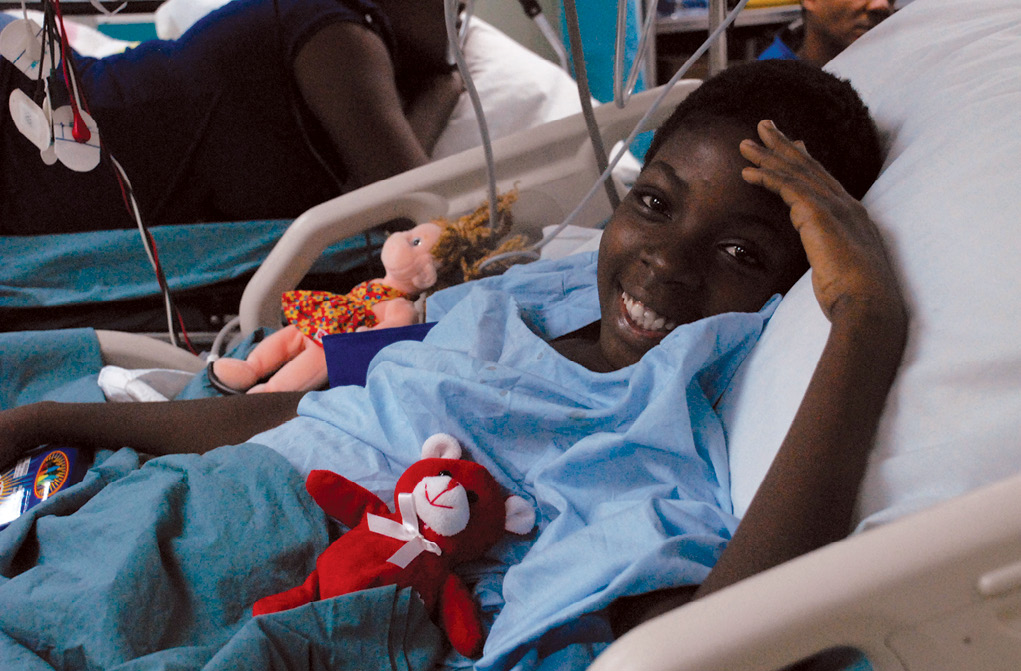 A young female patient receives treatment 10 February 2010 aboard the USNS <em>Comfort</em> in Port-au-Prince, Haiti.