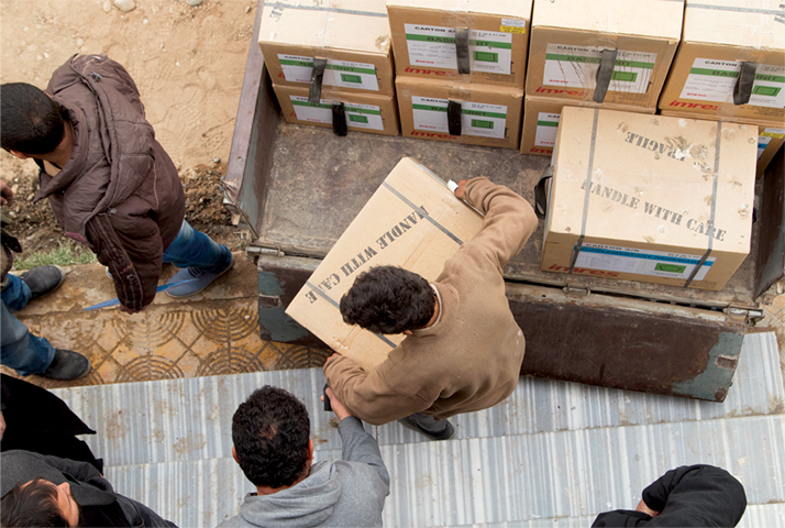 Medical equipment is delivered to a Raqqa Civil Council (RCC) medical facility 21 December 2017 in Khatuniyah, Syria.