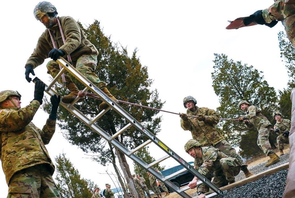 Candidates attempt to traverse an obstacle at the Leader Reaction Course 23 January 2020 during the Battalion Commander Assessment Program at Fort Knox, Kentucky.