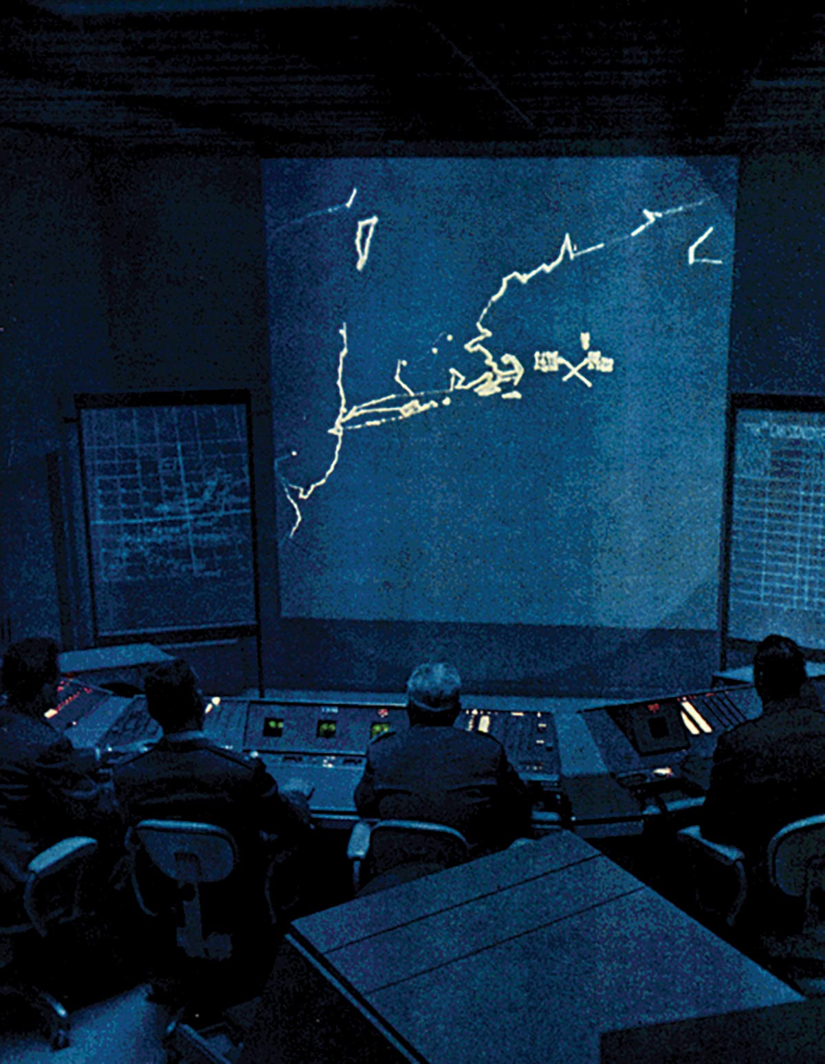 An image of Cape Cod, Massachusetts, is displayed on screen in a Semi-Automatic Ground Environment (SAGE) control room during the Cold War. SAGE provided the foundation for linking many computer systems. (Photo courtesy of the U.S. Air Force)