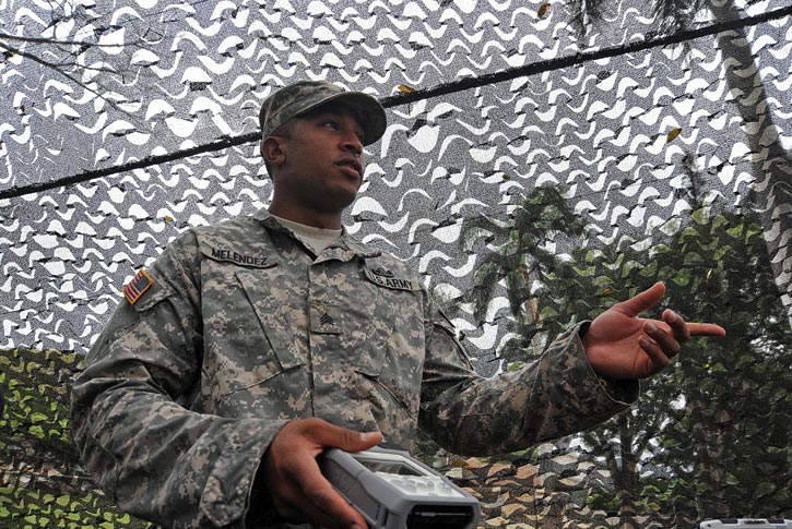 Sgt. Felipe Melendez talks about the capabilities of the 8th Theater Support Command’s Explosive Ordinance Disposal Team in April at Schofield Barracks, Hawaii. 