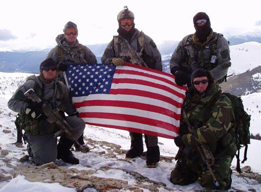 Master Sgt. Michael Lindsay (top, right) poses with other Soldiers on a mountain in Colorado. (Photo courtesy of Master Sgt. Michael Lindsay)