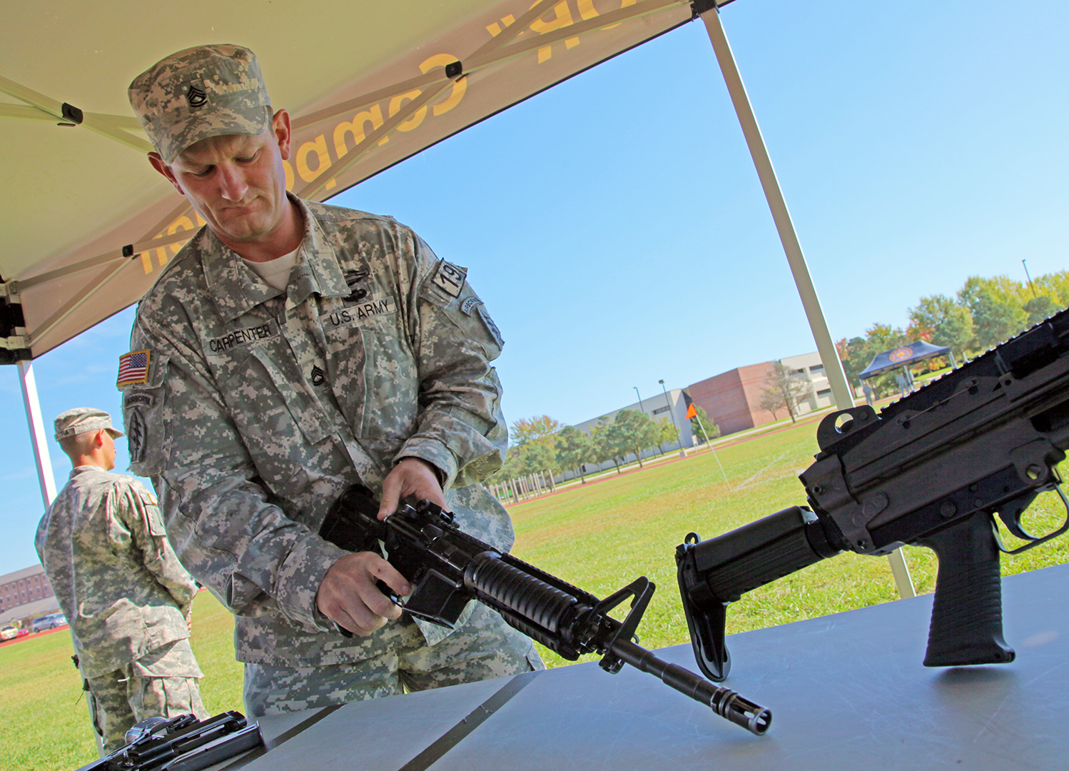 Carpenter assembles a weapon Thursday during the 2014 Best Warrior Competition. (Photo by Pvt. Rowan Anderson)